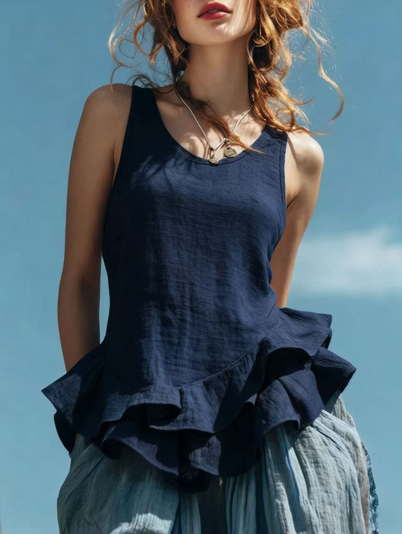 Casual Sleeveless Top with Ruffled Hem